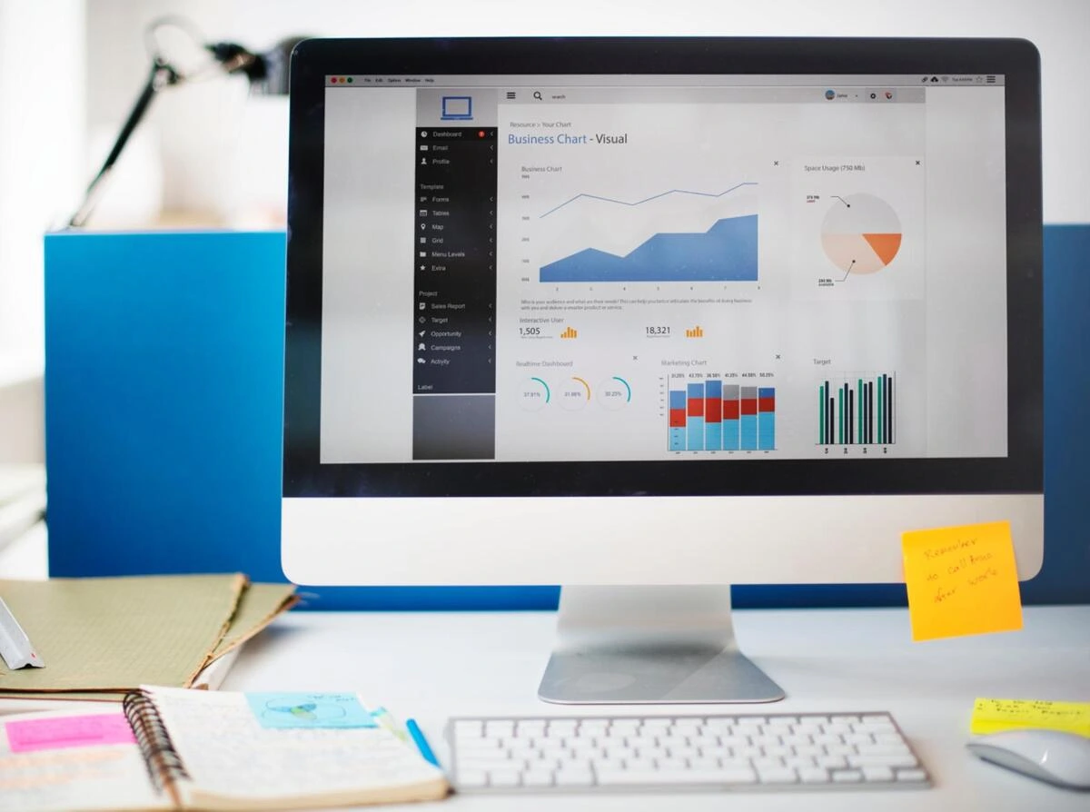 Website Performance Analytics Dashboard Desktop monitor displaying a website analytics dashboard with traffic charts
