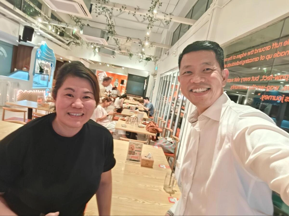 web design discussion with Bailey and Patch Pet cafe Our Founder Mr Terence Sim with Ms Rachel from Bailey and Patch Pet Cafe